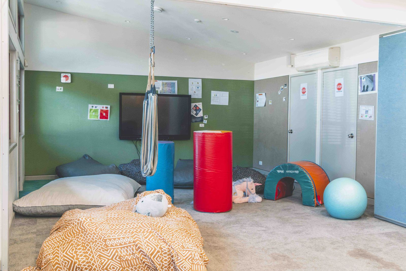 Sensory room with calming equipment and soft furnishings